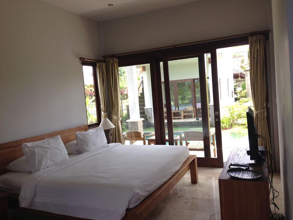วิลลา เกมูนิง Hotel เตกากาลัง ภายนอก รูปภาพ